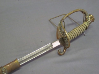 A Venezuelan Naval Officer's sword with etched blade, gilt hilt and shagreen grip complete with scabbard