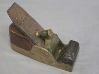 A 19th Century brass bottomed smoothing plane 7"