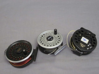 An Intrepid Dragonfly centre pin fishing reel, a Diplomat 278  centre pin fishing reel and a Leeda Rim Fly centre pin fishing  reel