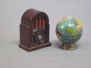 A brown Bakelite pencil sharpener in the form of a radio and a  miniature German pencil sharpener in the form of a Globe