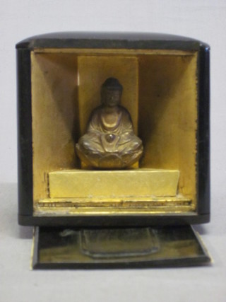 An Eastern carved hardwood shrine box with panelled doors to  the side 3"