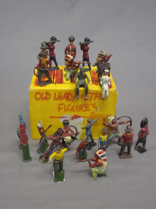 A collection of various lead and tin soldiers of cow boys etc