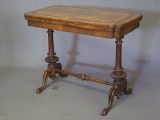 A handsome Victorian figured walnut card table of D shape, raised on turned columns with H framed stretcher 34 1/2"