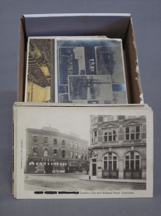 A collection of various black and white postcards