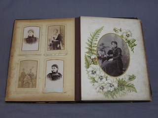 A Victorian leather bound photograph album