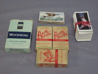 A set of Woodbine playing cards and a small collection of cigarette cards etc