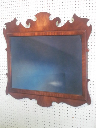 A Chippendale style rectangular plate mirror contained in a  mahogany framed 27"