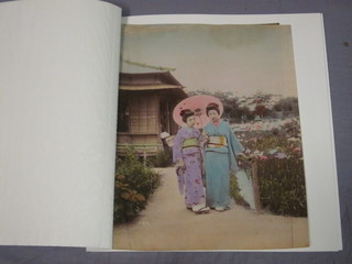 A collection of various early Japanese coloured photographs