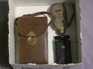 A Dynamo torch, a Kodak folding camera and an Ensign folding  camera