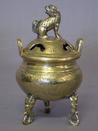 An Oriental pierced bronze Koro with seal mark to base, raised  on 3 pierced supports 8 1/2"