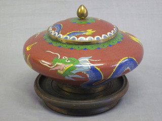 A circular red ground cloisonne jar and cover decorated a  dragon, the base with seal mark 7"