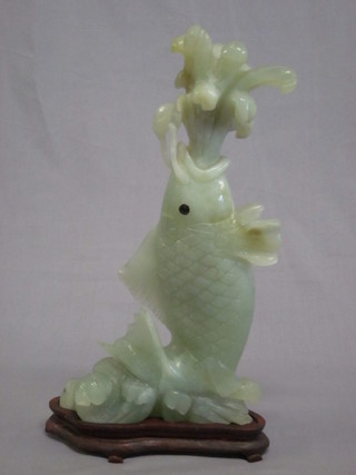 A green hardstone figure of a fish spouting water 13"