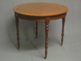 An Edwardian walnut D shaped card table, raised on turned supports 36"