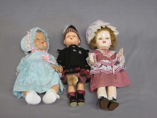 A collection of various dolls