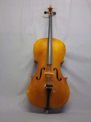 A Cello with paper label marked John Charwick, missing 2 pegs  and hole to top right hand side of body,