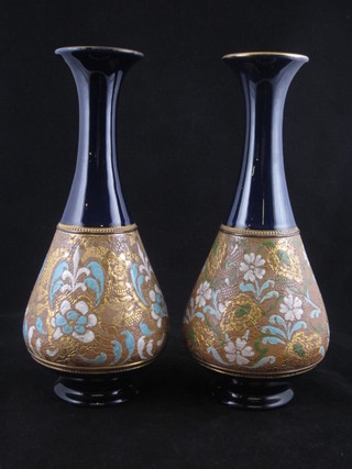 A pair of Doulton blue glazed club shaped vases 11"