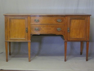 An Edwardian inlaid mahogany bow front sideboard fitted 2 drawers flanked by a pair of cupboards, raised on square tapering  supports 66"