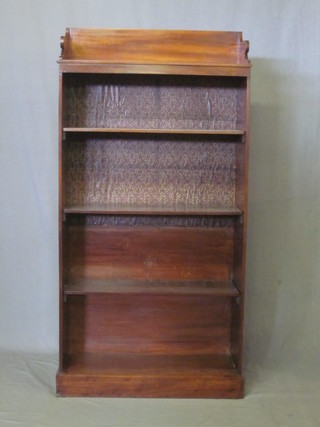 An Edwardian mahogany bookcase with three-quarter gallery, the  interior fitted adjustable shelves, 28"