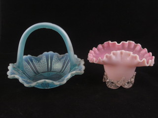 A Victorian pinched opaque glass vase 5" and a blue pressed  glass basket 6"
