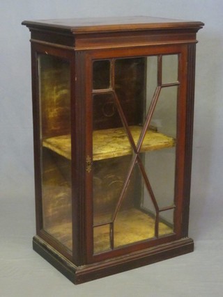 A 19th Century mahogany pedestal display cabinet, the interior fitted shelves and enclosed by astragal glazed panelled doors,  raised on a platform base 20"
