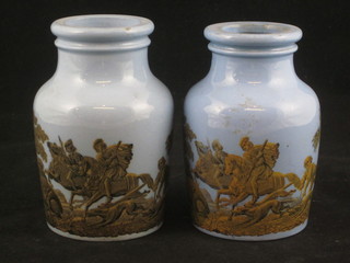 A pair of 19th Century blue glazed Prattware bottles decorated  boar hunting scenes 4"