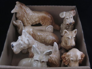 A Sylvac brown glazed figure of a Collie, do. Dachshund, 6  other figures of dogs and a Wade figure of a dog