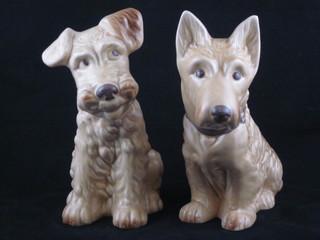 A pair of Sylvac figures of seated dogs, bases marked 207 and  1379 8"