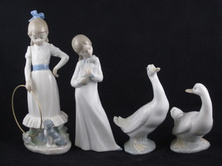 A Nao figure of a girl with hoop 10", 1 other standing girl with puppy 8" and 2 Nao figures of geese 6" and 5"