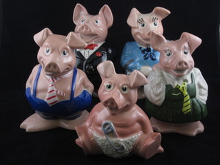 A set of 5 Wade Natwest piggy banks