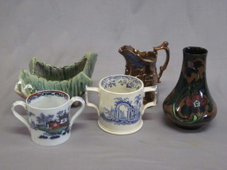 An Art Nouveau style pottery club shaped vase 8", a lustre jug  6", a rectangular Art Pottery vase 9" and 2 loving cups