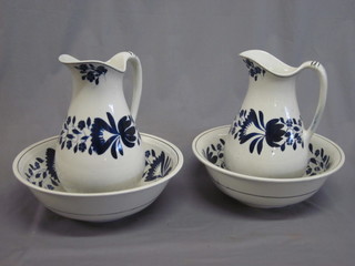 A pair of Lindfield Luff & Co Warnham Pottery blue and white  wash bowls and ewers, both bowls cracked and 1 ewer cracked,