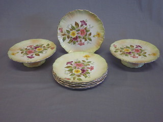 A Carltonware 8 piece fruit service comprising 2 8 1/2"  comports and 6 plates 8 1/2"