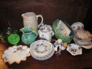A Clarice Cliff white glazed jug with fruit decoration 8", a  Sylvac green leaf pottery boat shaped vase 10", an Art Deco  green pottery jug 5", a Derby style sandwich set, a biscuit  porcelain figure of a boy with ball and other decorative ceramics
