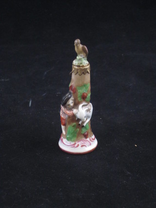 A Continental porcelain "scent" bottle decorated a child hiding  from a goat 3"