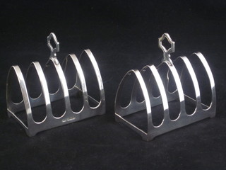A matched pair of silver 5 bar toast racks, Sheffield 1933 and 1961, 3 ozs