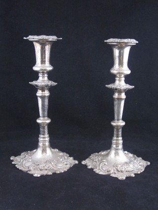 A pair of silver plated Rococo style candlesticks with detachable  sconces 10"