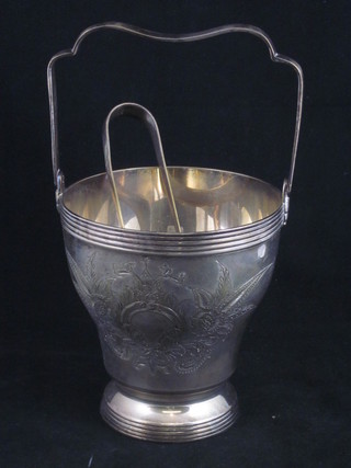 A silver plated ice pail and pair of tongs