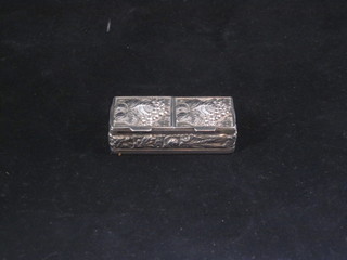 A rectangular embossed silver pill box with vine decoration  marked 925,