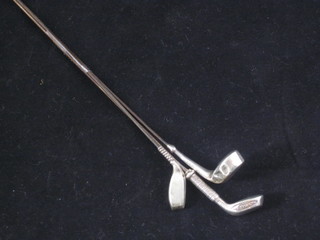 3 silver hat pins in the form of golf clubs