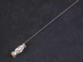 A silver hat pin decorated a teddy bear, slight hole,