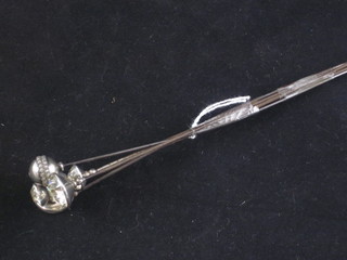 A circular silver hat pin and 5 others