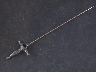 A "jet" hat pin in the form of a sword