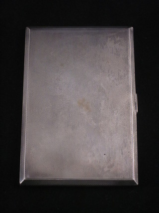 A silver cigarette case with engine turned decoration,  Birmingham 1931, by Mappin & Webb, 6 ozs