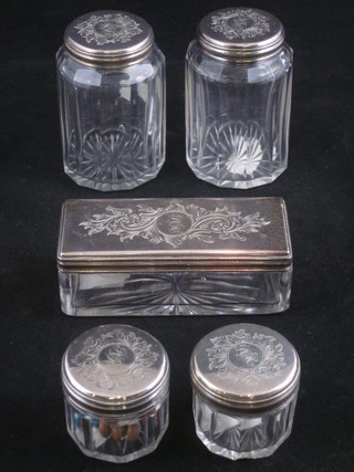 A Victorian rectangular cut glass pin jar with silver lid, 2  matching circular bottles and 2 smaller ditto with silver lid,  London 1873, retailed by Austin of Dublin