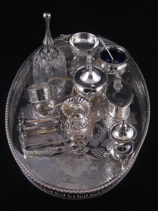 A silver napkin ring, 2 others, an oval galleried tea tray, a silver  plated salt and mustard pot etc