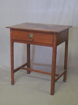 An 18th/19th Century oak side table fitted a frieze drawer, raised on square supports with H framed stretcher 28"