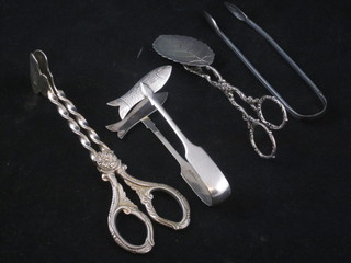 A pair of silver plated sandwich servers, 2 silver plated servers decorated fish and a pair of tongs