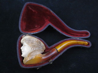 A Victorian Meerschaum pipe, the bowl in the form of a  bonnetted ladies head