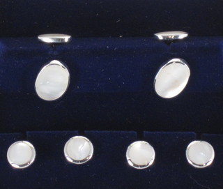 A pair of silver and mother of pearl mounted cufflinks together  with 4 silver mother of pearl dress studs