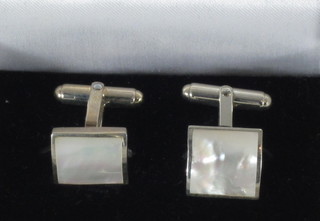 A pair of gentleman's silver cufflinks with mother of pearl decoration
